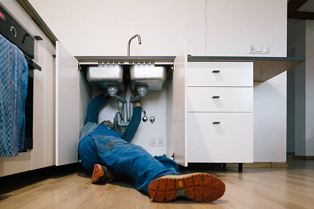 Professional Drain Cleaning technician working in Newcomerstown, OH